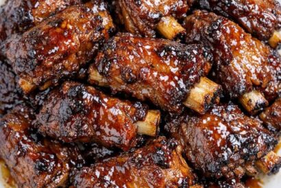 Thumbnail for My neighbor who grew up on a farm taught me this old trick. Drop 4 things in the pot and by evening the meat literally falls off the bone into a thick sticky glaze.