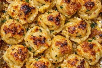 Thumbnail for Cheesy Garlic Tortellini Bake