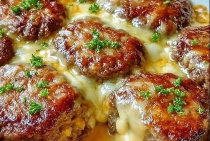 Thumbnail for Cheesy Baked Meatballs in Creamy Sauce (Juicy, Melty & Comfort Food Heaven)