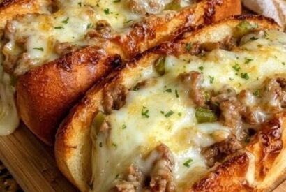 Thumbnail for Cheesy Philly Cheesesteaks